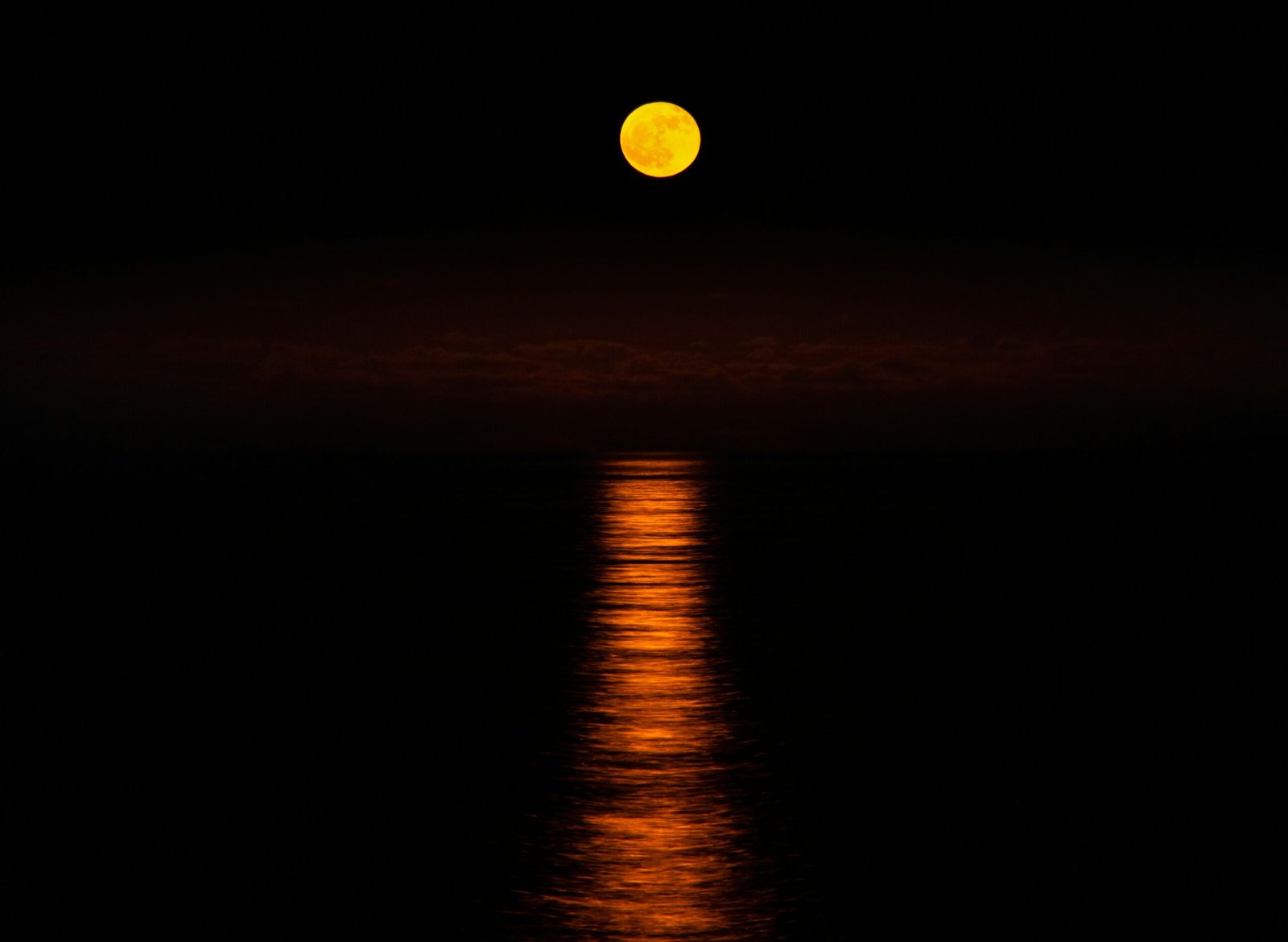 Strawberry Moon over the sea